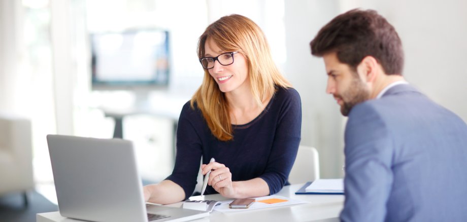 Financial advisor with client