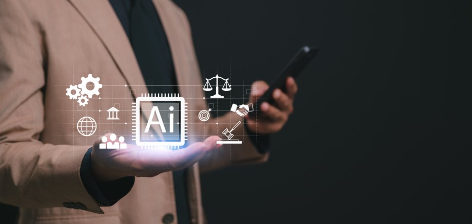 Businessman holding smartphone displays digital hologram interface featuring artificial intelligence regulation, ethics icons like scales justice, gavel, gears, handshake, target, globe representing