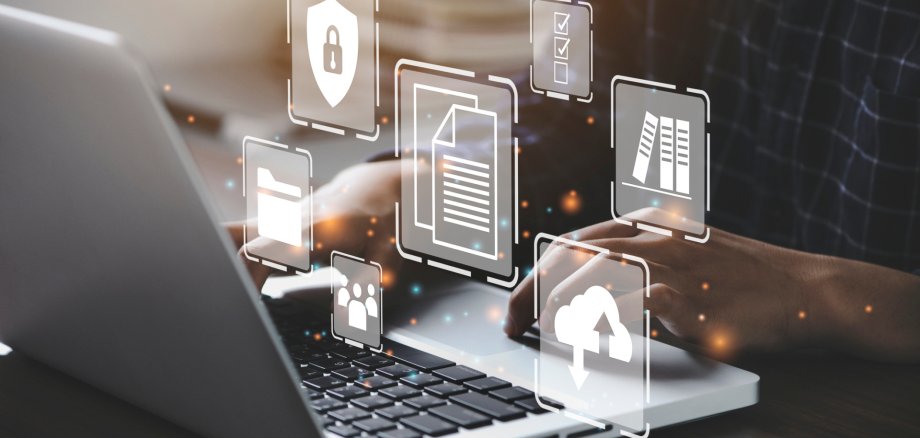 Businessman using a computer to document management concept, online documentation database and digital file storage system/software, records keeping, database technology, file access, doc sharing.